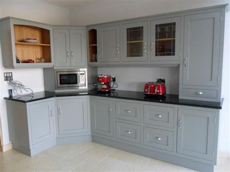 Craftsmen in paint and paper. Staples Woodcraft | Grey kitchens, Built in wine cooler ...