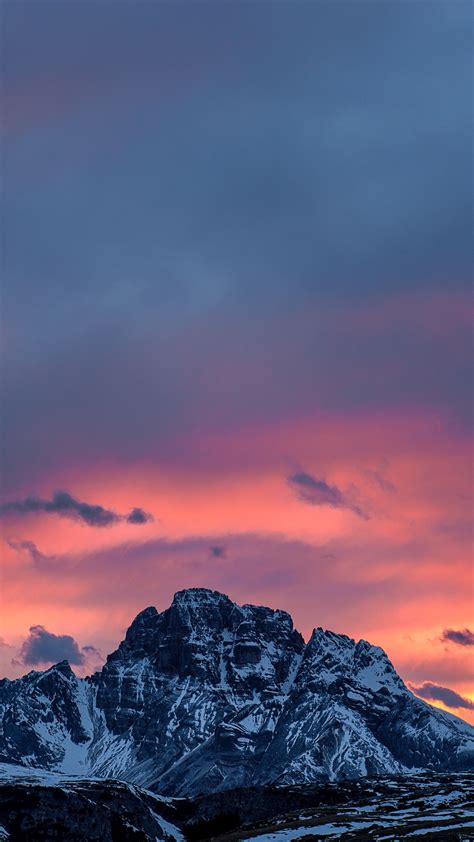 Download Wallpaper 1440x2560 Mountains Sunset Peaks Snowy Sky