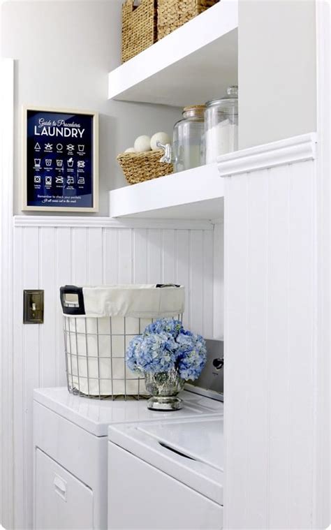 To hide the piece of plywood from the front to help give the illusion of an actually floating shelf. Floating Shelves in the Laundry Room - KnockOffDecor.com