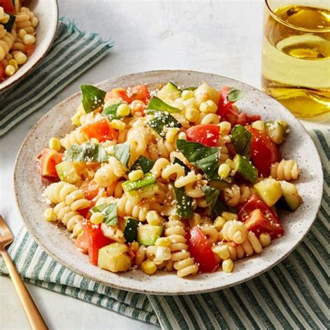 Fusilli Bucati Pasta With Summer Squash Corn And Heritage Globe