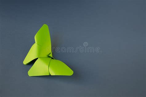 Green Paper Butterfly Origami Isolated On A Grey Background Stock Image
