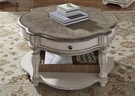 Chic and light filled with vast sea views. Magnolia Traditional Antique White Round Coffee Table w ...