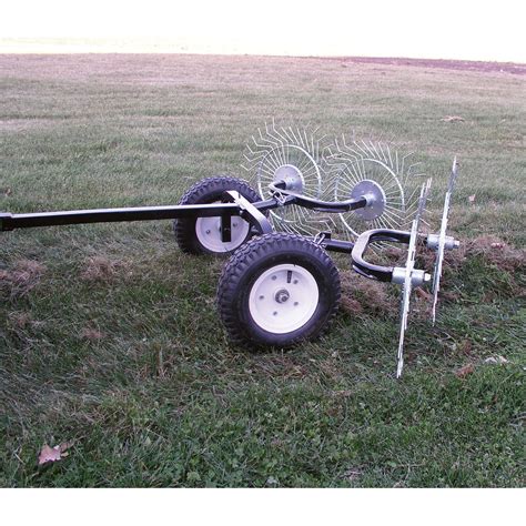 The Yard Tuff Pull-Behind Dethatching Rake turns your ATV or lawn