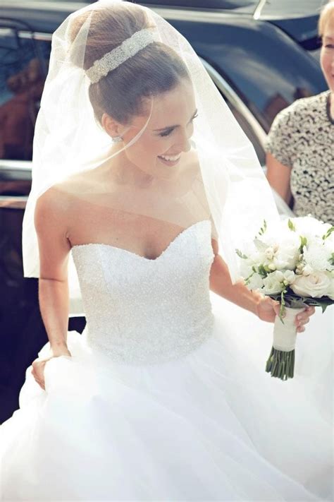 When it comes to wedding hairstyles it is always something special. top knot bun for brides | Bride hairstyles, Wedding ...