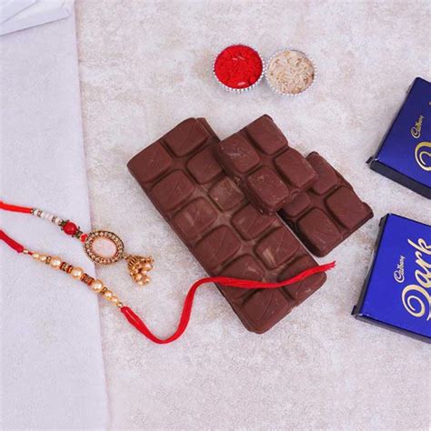 Send Combo Of Bhaiya N Bhabhi Rakhi With Drak Milk Chocolate Online
