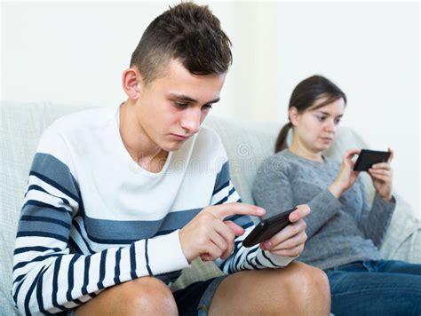 Mother And Son With Smartphones At Home Stock Image Image Of Parent