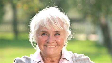 Thoughtful Senior Woman Smiling Joyful Old Stock Footage Sbv 313955723