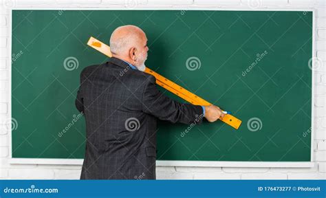 Senior Man Teacher Use Ruler While Drawing Bearded Tutor Man Draw With