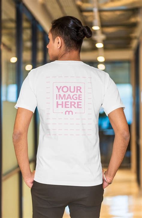 Backside T Shirt Mockup On Corporate Office Employee Mediamodifier