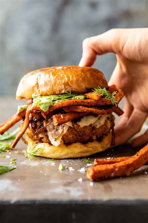 Crispy Quinoa Burgers Topped With Sweet Potato Fries And Beer
