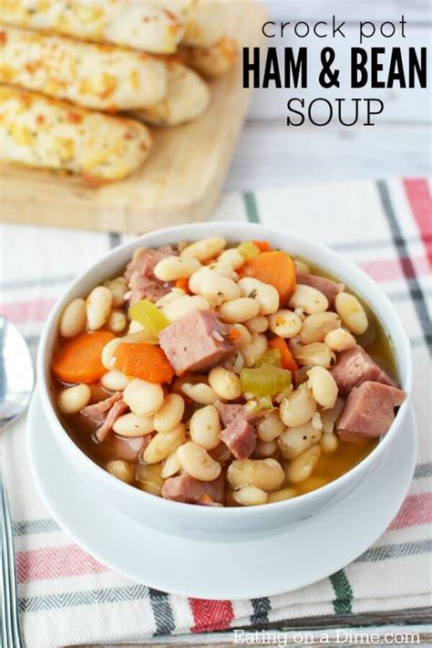 These easy crockpot pinto beans are cooked with ham and a variety of chopped vegetables and seasonings. Ham and Bean Soup Crock Pot Recipe - Easy Crock Pot Ham and Beans