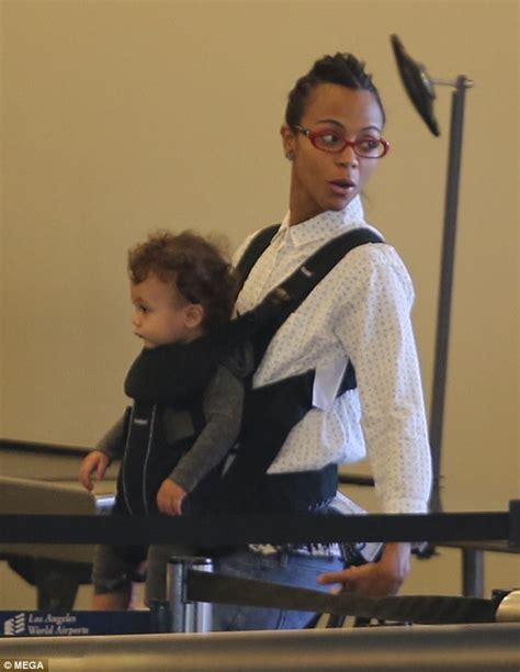 zoe saldana arrives at lax with son zen daily mail online
