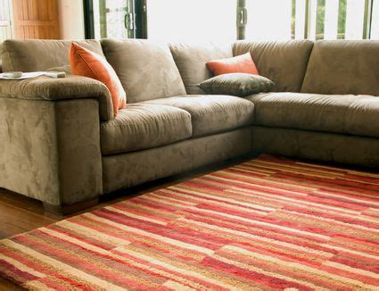 With furniture, arrange your furniture over the area rug to stop it from moving on the floor. Tips for Using Area Rugs Over Carpet