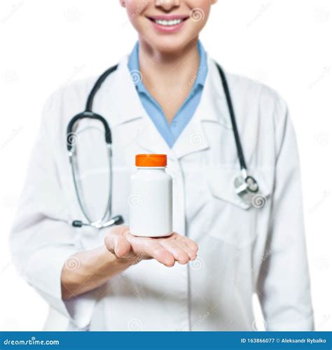 Doctor Holding Bottle Of Pills On White Background The Concept Of