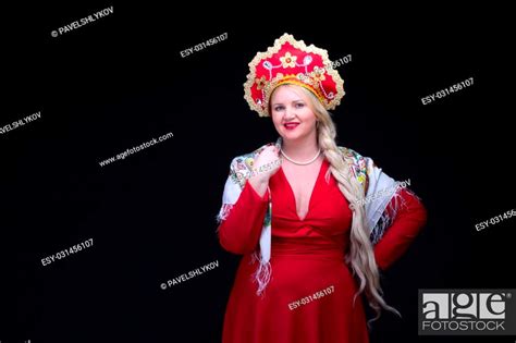 Girl Standing In Russian Traditional Costume Plus Size Woman Is Wearing Sarafan And Kokoshnik