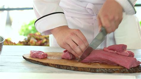 Mans Hands Cutting Meat Chef With A Knife Fresh Veal For Medallion Steak Stock Video Footage