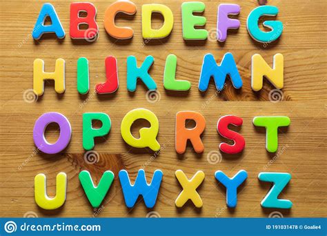 Colorful Letters On Wooden Background Alphabetical Order Stock Photo