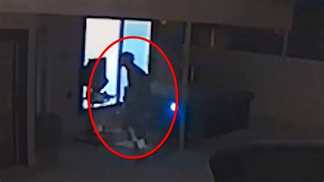 terrifying moment masked intruder prowls around los angeles home for more than an hour before