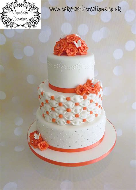Coral And White Wedding Cake With Billowing Pillows And Roses Coral