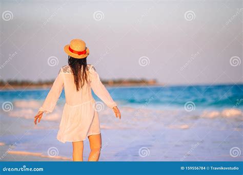 Young Beautiful Woman On Tropical Beach In Sunset Stock Photo Image