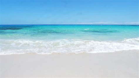 White Sandy Beach Lazy Waves Of Crystal Clear