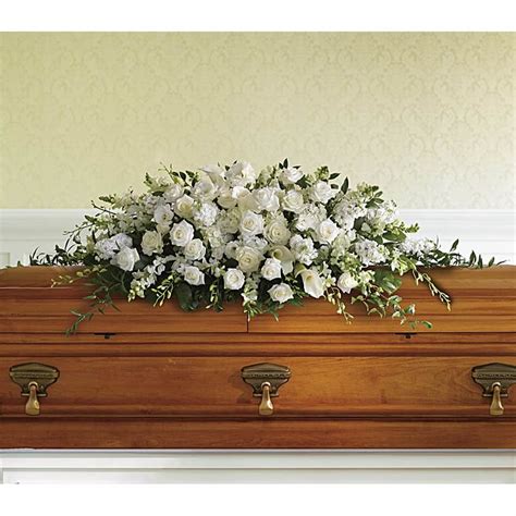 Purity And Peace Casket Spray H3856 Funeral Flowers Delivery In