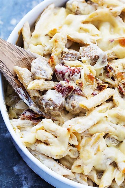 Remove from heat and fold in sausage and 1/3 cup each cheddar and gruyère. Cheesy Sausage Pasta Bake - Cooking on a Budget