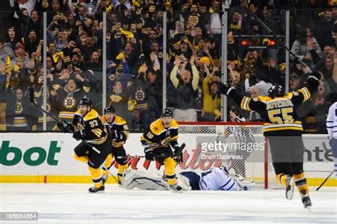 Patrice Bergeron Of The Boston Bruins Scores In Overtime Against The