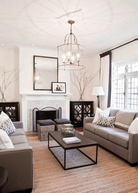 A Soothing Monochromatic Grey Living Room With A Stunning Chandelier