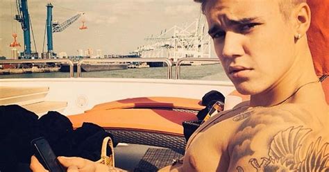 Justin Bieber Poses Topless On A Boat Mirror Online