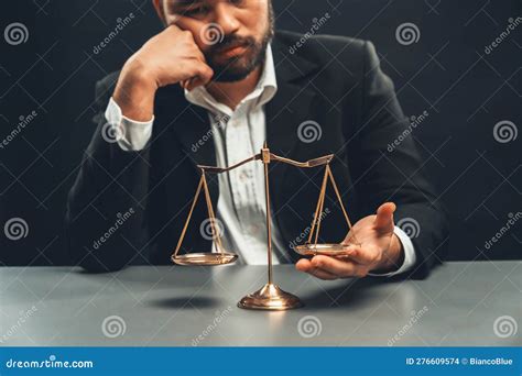 Lawyer Or Judge In Formal Black Suit Hold Unbalanced Scale Equility