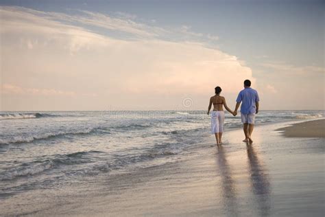 Couple Walking On Beach Stock Photo Image Of Husband 12666774