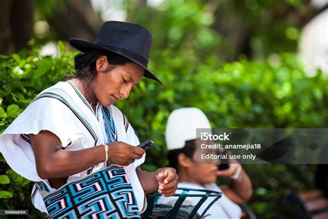 Two Arhuaco Men Dressed With Their Traditional Clothes Using Their