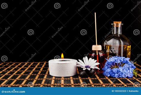 Spa Decoration With Stones Candle With Massage Oil On A Blac Stock Image Image Of Bodycare