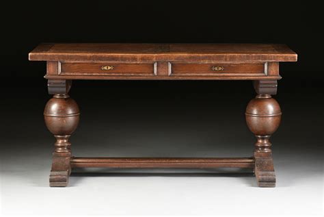 Sold Price A Jacobean Style Carved Oak Library Table Early 20th