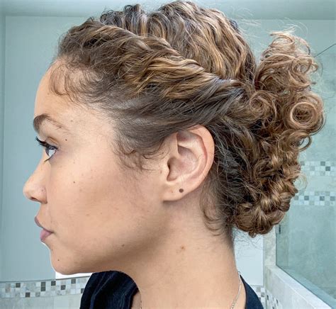 These french braids are loose and only bring in hair from the side closest to the face, as opposed from both sides of the braid. Curly Hair Updo Tutorial: Double-Braided Low Bun - Curl ...