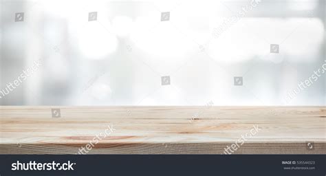 Wood Table Top On Blur Glass Stock Photo 535544323