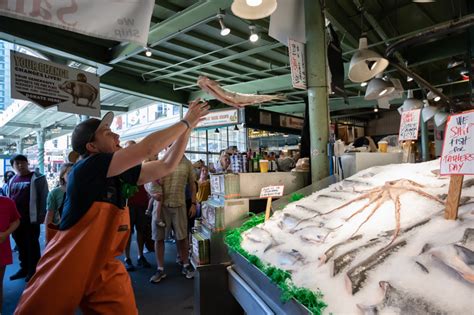 Flying Fish At Seattles Pike Place Fish Market Robbie Morrisons
