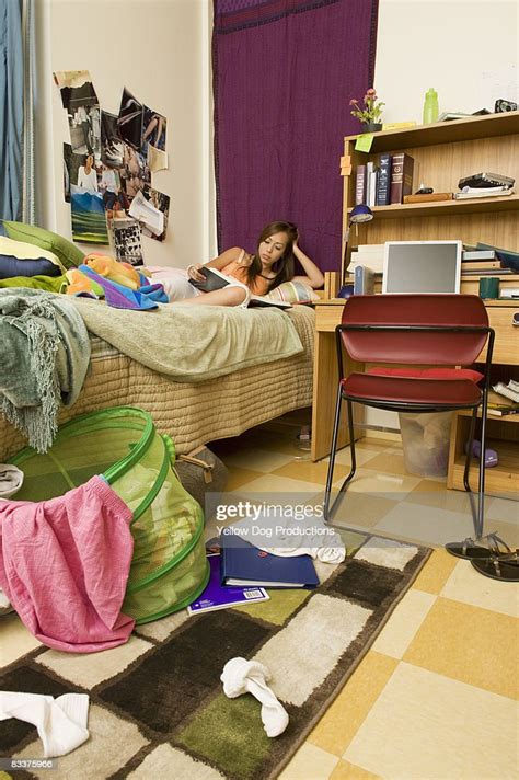 College Student Studying In Messy Dorm Room Photo Getty Images