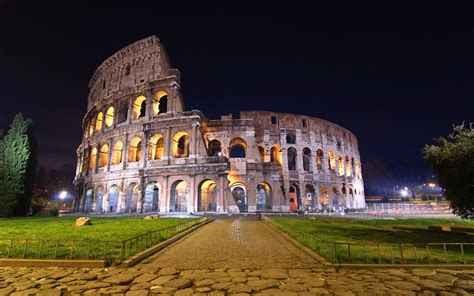 Colosseum At Night In Italy