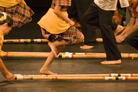 Tinikling The National Dance Of The Philippines With Bamboo Poles