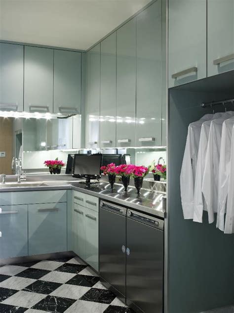 What's the best design for a small laundry room? Mirror Backsplash - Modern - laundry room - Jamie Herzlinger