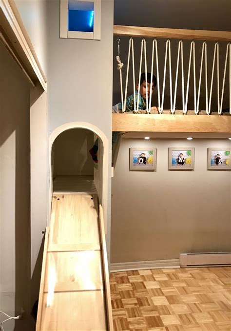 This loft bed is designed to open up floor space usually consumed by a bed. Kids Loft Bed with slide and hidden playhouse DIY lit d'enfant | Kids loft beds