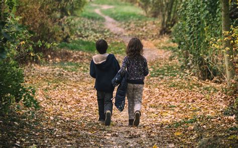 Children Walking Away On The Forest Path Copyright Free Photo By M