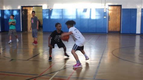The Youth Playing Basketball At The Salvation Army Summer Program Camp