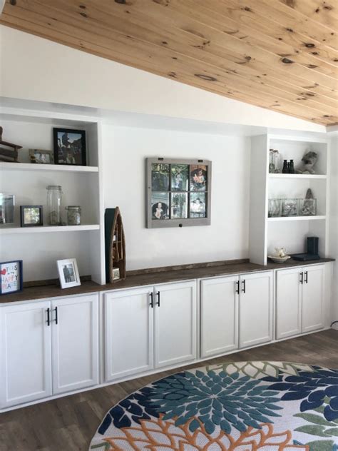 That way she could have drawers for clothing and jewelry, and large cabinets for random items. built ins using upper cabinets at cottage - Just Call Me ...