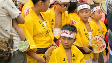 Japanese Children Dancing Traditional Awaodori Dance In The Famous