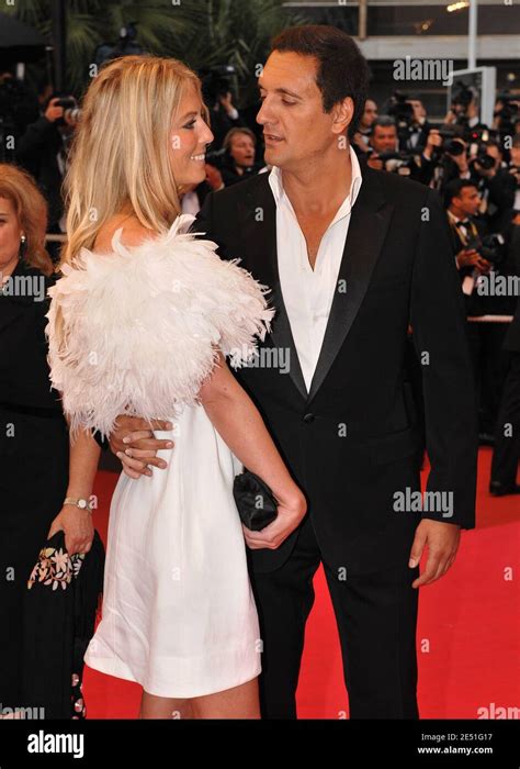 Dany Brillant And His Girlfriend Nathalie Moury Arriving At The Palais Des Festivals In Cannes