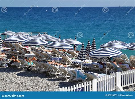 View Of Umbrellas And Chairs On Beach In Nice Editorial Stock Image