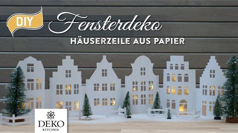 Das bild steht in hochauflösender qualität bis zu 3728x3456 zum download zur verfügung. DIY-Weihnachtsdeko: Fensterdeko mit Häuserzeile aus Papier ...